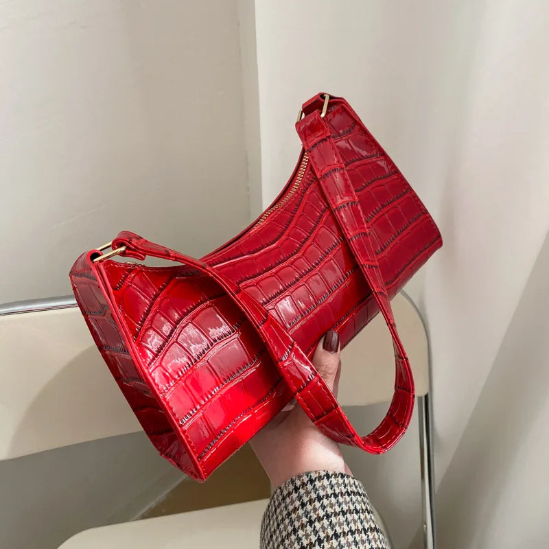 Maisie | Shiny shoulder bag with alligator pattern