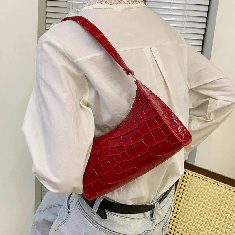 Maisie | Shiny shoulder bag with alligator pattern