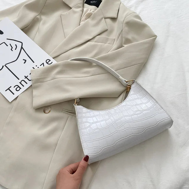 Maisie | Shiny shoulder bag with alligator pattern