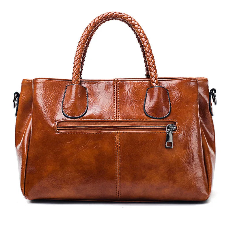 Mae | Elegant leather handbag with braided handle