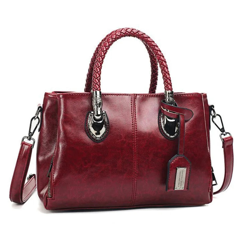 Mae | Elegant leather handbag with braided handle