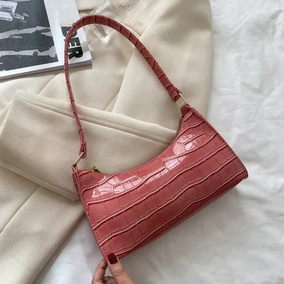 Maisie | Shiny shoulder bag with alligator pattern
