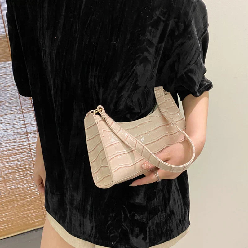 Maisie | Shiny shoulder bag with alligator pattern
