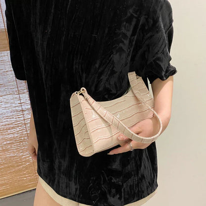Maisie | Shiny shoulder bag with alligator pattern