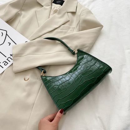 Maisie | Shiny shoulder bag with alligator pattern
